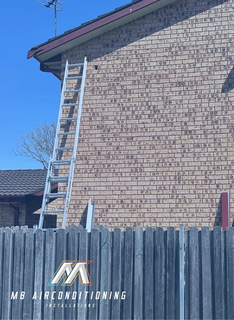 Service ladder set up for a maintenance visit at a Western Sydney home