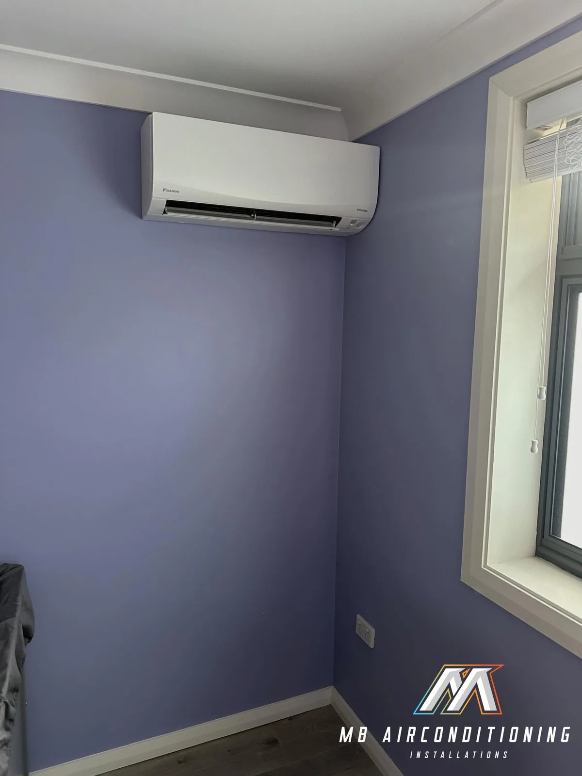 Split system · feature wall by MB Air Conditioning in Western Sydney